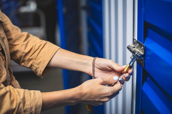 A woman locking a container